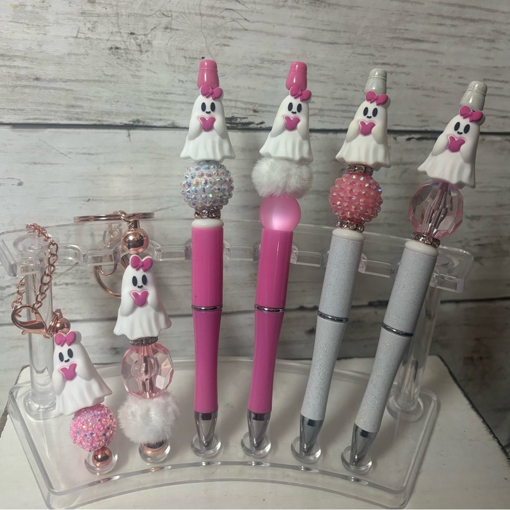 Halloween pens, keychains, and Stanley charms